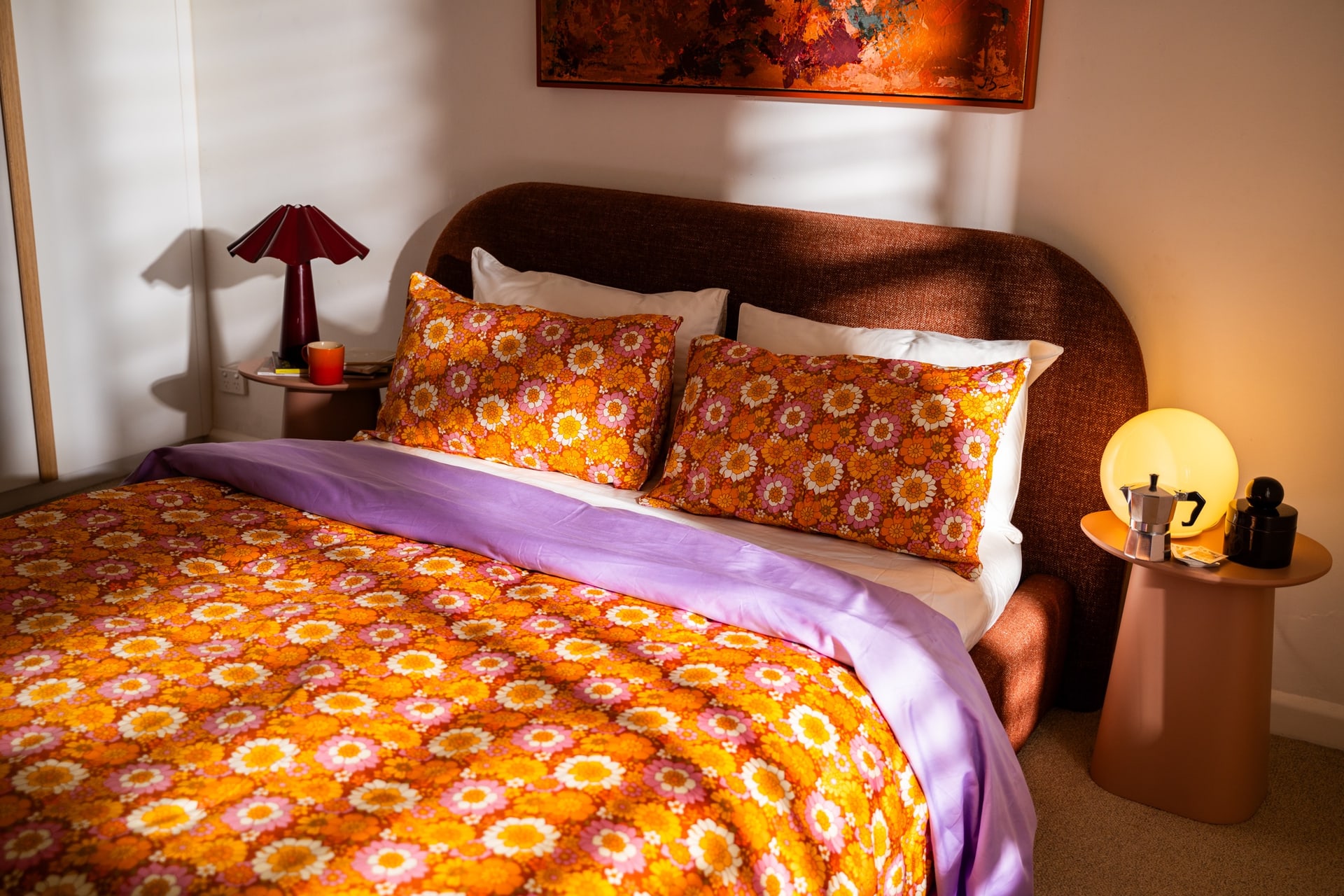 Flower Child quilt and pillowcases layered with Lilac and Cloud cotton